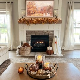 cast stone mantel with cozy fall decor