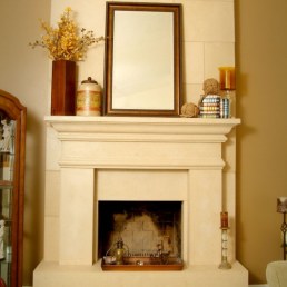 cast stone mantel with vintage accents