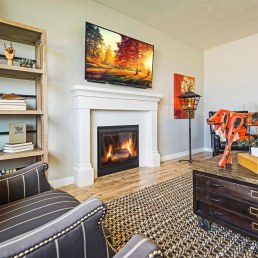 cast stone mantel with warm decor